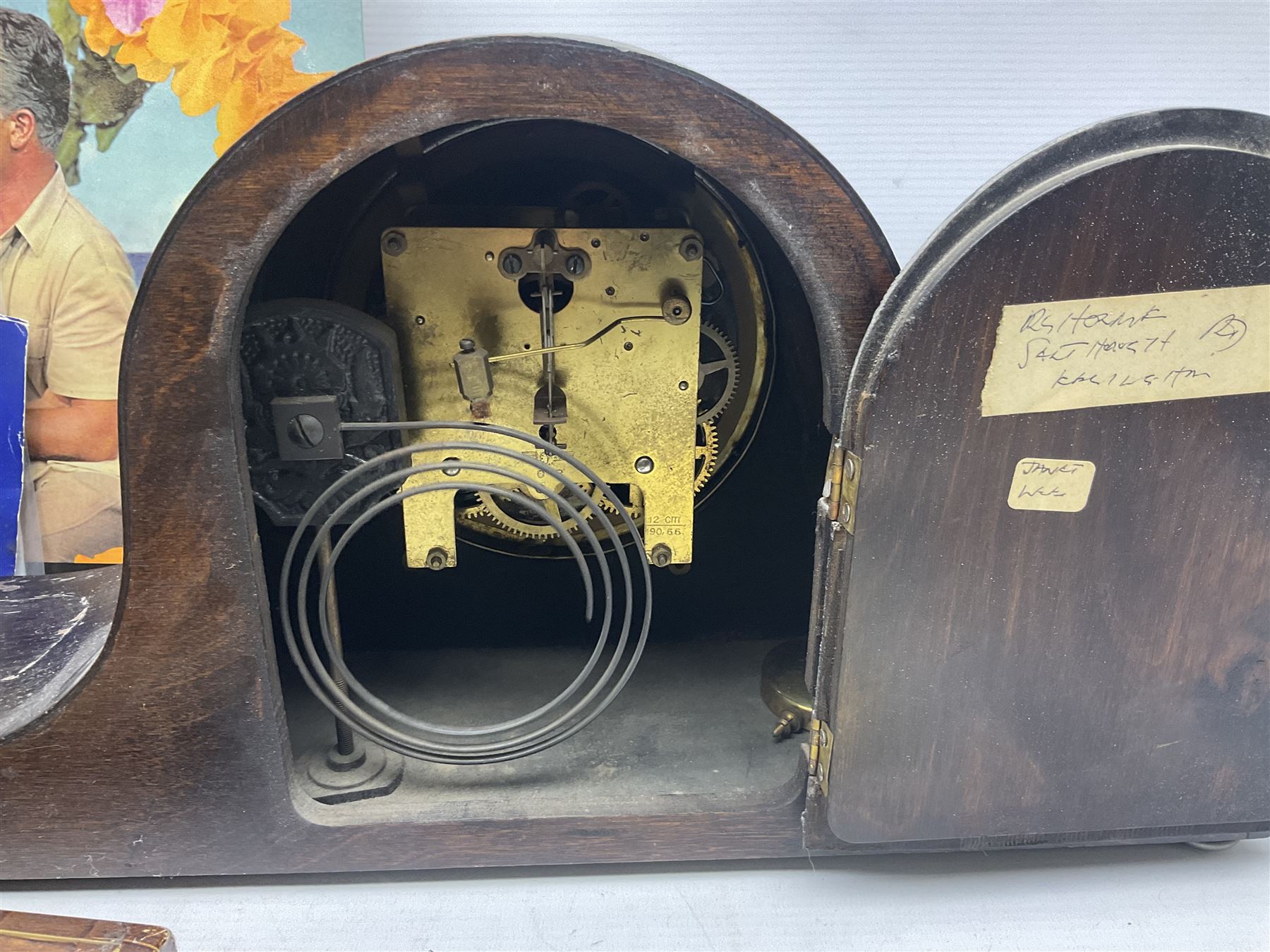 Mid 20th century cigarette box in the form of a gondola, the faux tortoiseshell with mother of pearl inlay (a/f), cased mantel clock with silvered numerical dial, oak lidded tea jar caddy, oak box, silver-plate cutlery, quantity of records, Smith's empire miniature clock, stamps etc