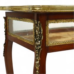 19th century, Louis XV style, bronze mounted bijouterie table, the hinged rectangular bevelled glass top with gilt bronze foliate beading, side glass panels  and plush-lined velvet interior, raised on cabriole legs, with gilt bronze masks and sabots