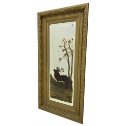 Late 19th century gilt framed wall mirror, the frame decorated with trailing foliage and thistles, bevelled mirror plate hand painted with stag in woodland 