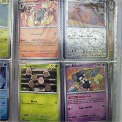 Collection of modern Pokemon TCG trading cards from the Scarlet & Violet and Sword & Shield eras, contained within in two folders, opened packets and loose, together with a graded Sword & Shield Silver Tempest Passiman TG08, GET Graded 9 Mint, two oversized cards, energy cards, vintage booklets and boxes, empty tins, 1998 Electronic Pokédex and other accessories