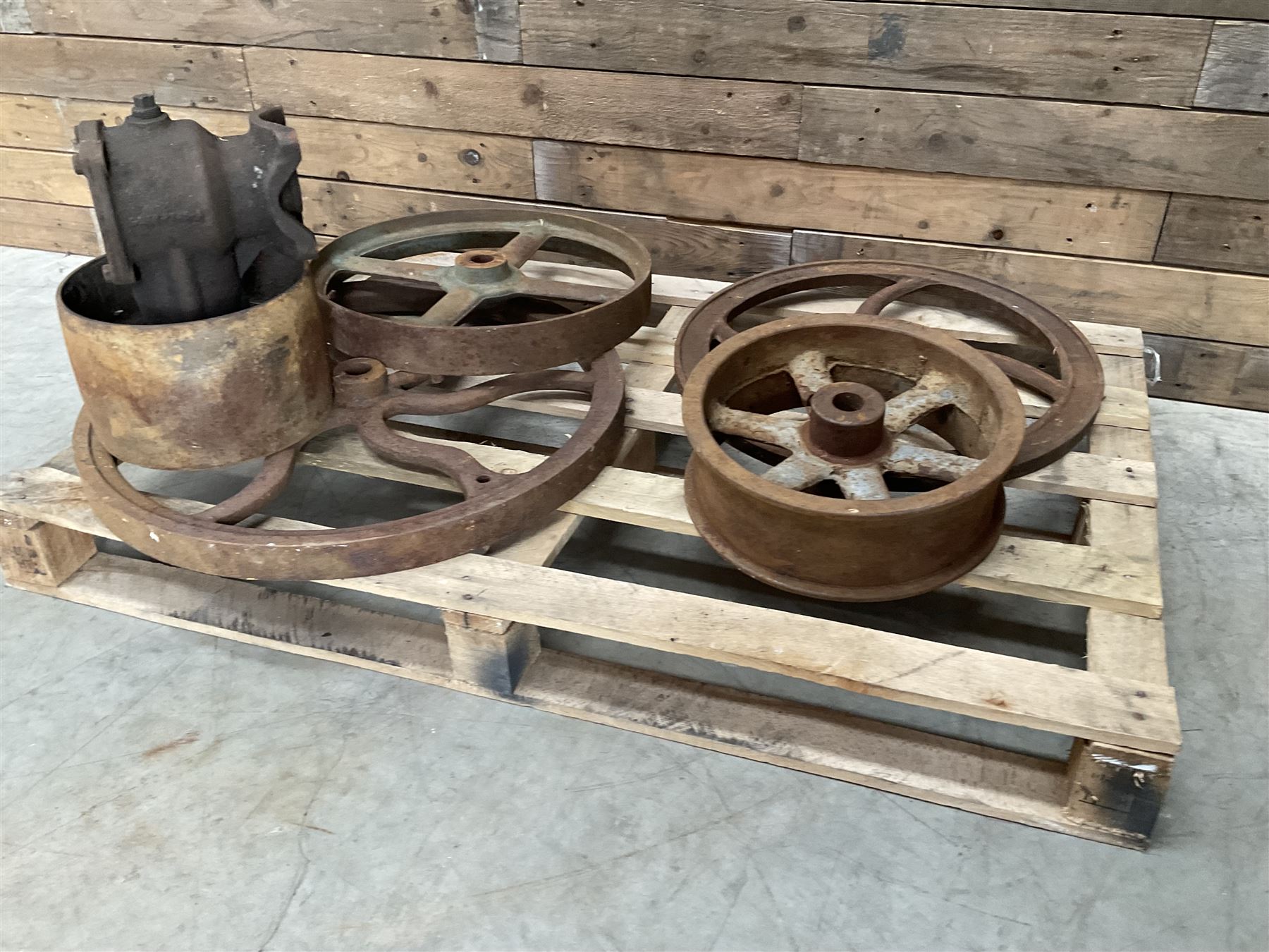 Various cast iron implement wheels