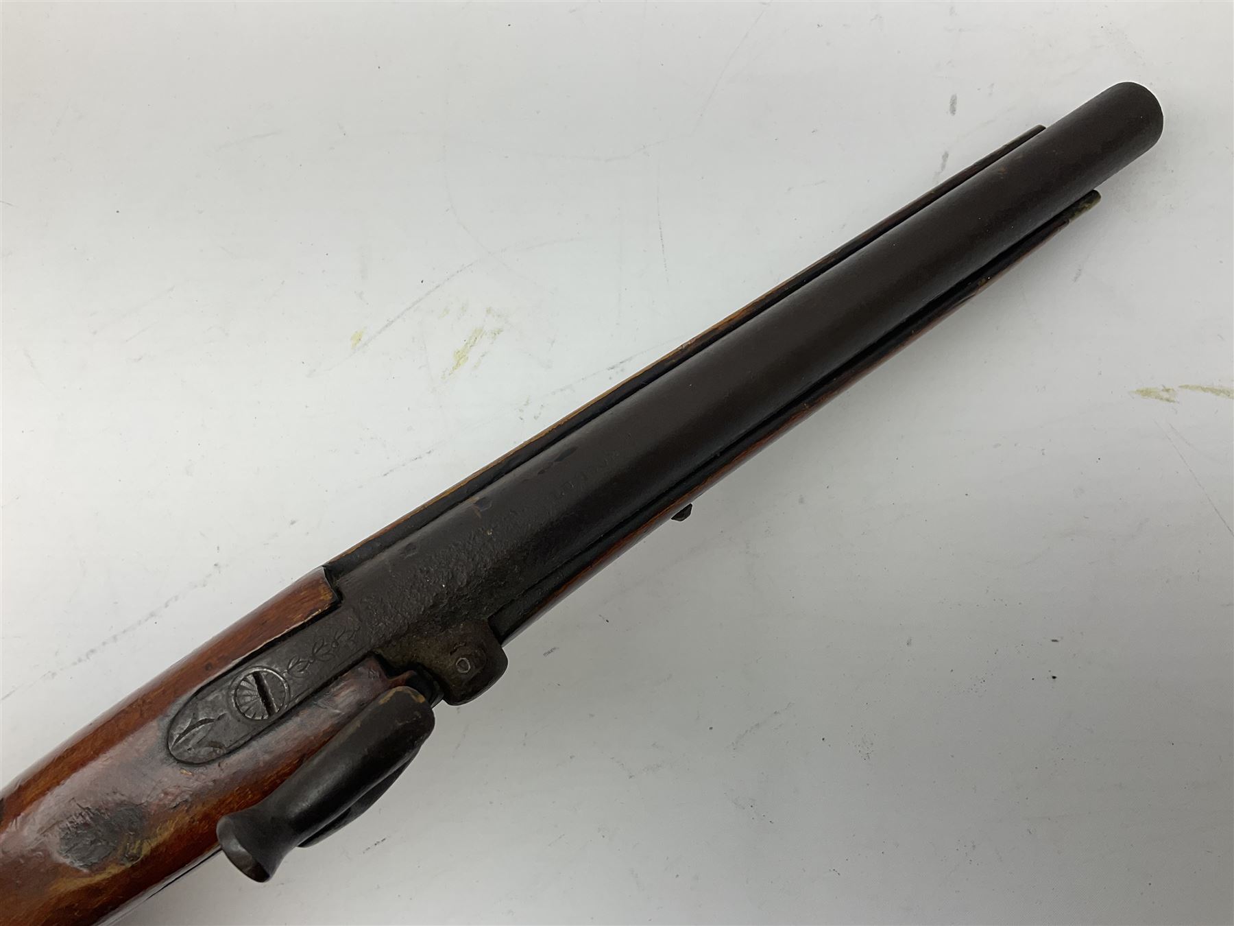 Re-manufactured percussion converted from flintlock single barrel pistol, the 20cm barrel with ramrod under, reused back action lock, brass furniture and hardwood stock L41cm overall