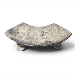 Weathered cast stone three-piece curved bench, raised on naturalist tree-stump style end supports