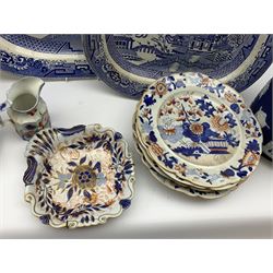 A collection of 19th century ceramics, to include an Adams Jasperware planter, decorated with a classical figural band upon a dark blue ground, D21cm, large blue and white tureen and cover, with twin handles and raised upon four paw feet, marked beneath Royal Persian, possibly Minton, nine Masons Ironstone Imari pattern plates, D26cm, Wedgwood cabbage leaf plate, another unmarked example, Imari pattern shell dessert dish, three blue and white platters, etc. 
