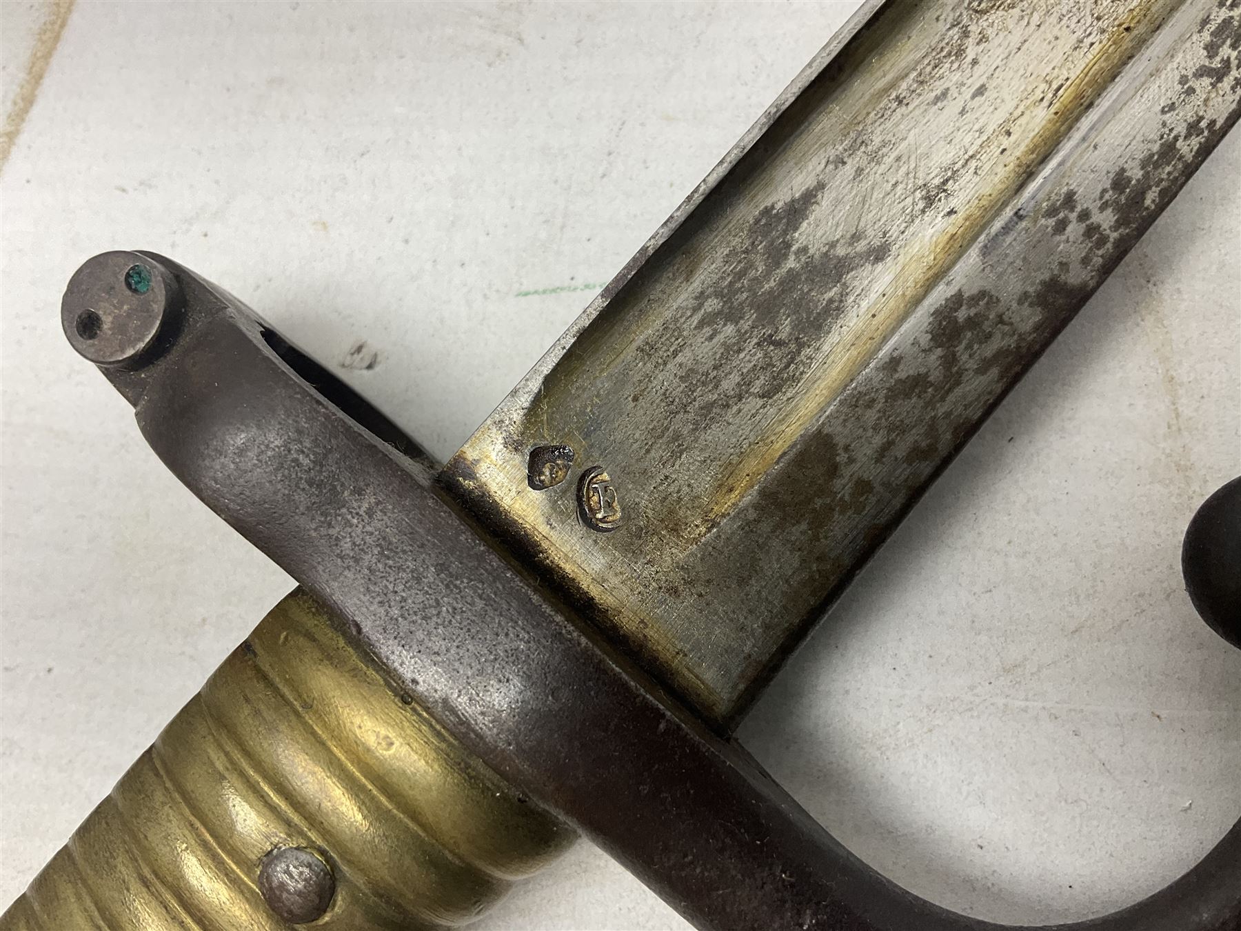 French Model 1866 Chassepot bayonet with 57cm curving fullered steel blade dated 1873 No.L63963; in steel scabbard with conforming number L71.5cm overall; and French St. Etienne Gras bayonet dated 1878 No.K10674 in steel scabbard numbered 79437 (2)