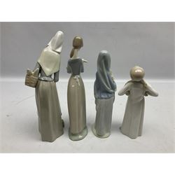 Four Lladro figures, comprising Shepherdess with Dog, no 1034, Girl with Lamb no 4505, Girl with Calla Lilies no 4650 and Gild stretching no 4872, all with original boxes, largest example H28cm