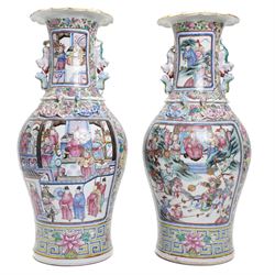 Large pair of 19th century Cantonese famille rose vases, each painted with various courtly scenes, including a display of warriors fighting on horseback before an official and his attendants, double Buddhist lion handles and applied at the shoulders with chilong, the lower band painted with Greek key motif, H58cm (2)