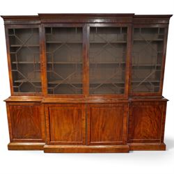 Fine Regency mahogany breakfront library bookcase, the stepped and moulded cornice over fo...