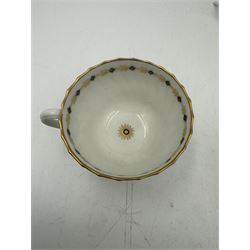 18th century Caughley blue and white sparrow jug, decorated in the Mother and Child pattern, circa 1780-1790, with underglaze C mark beneath, H9cm, together with a Worcester coffee cup, circa 1785 painted with floral sprays in underglaze blue and gilt, with crescent mark beneath, and a Caughley trio of tea cup, tea bowl and saucer, each of moulded wrythen fluted form and decorated with gilt and blue sprigs and bands, each with crescent mark beneath, (5)