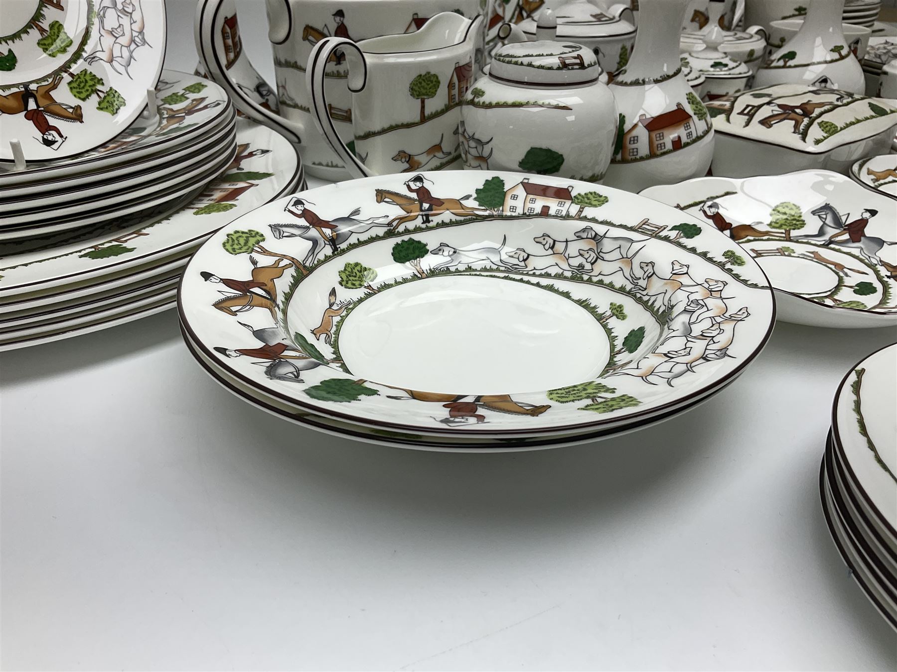 Wedgwood Hunting Scenes dinner and tea service for ten, to include dinner plates, side plates, dessert plates, cups and saucers, mugs, two large teapots, two milk jugs, etc, together with matching items by coalport and Staffordshire (94)