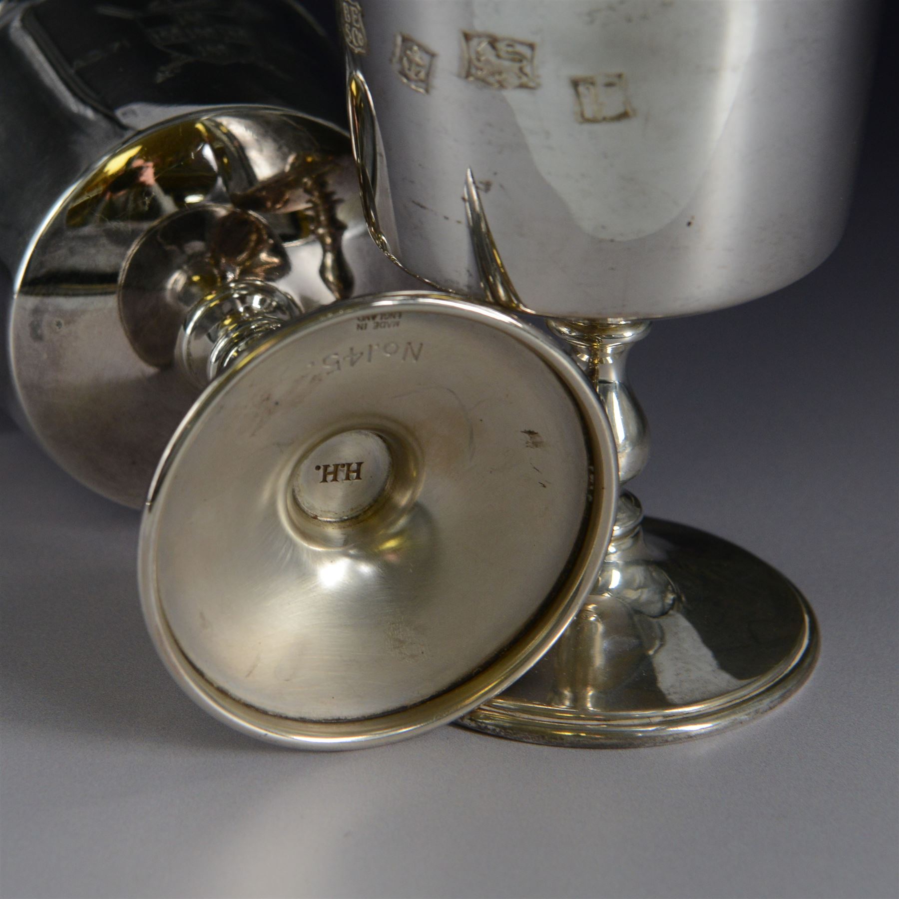 Pair of limited edition silver goblets, commemorating the 1900th  founding of the city of York by, the plain bowl with gilt interior and engraved with York crest dated AD71-1971, upon knopped stem and circular domed foot, hallmarked Barker Ellis Silver Co, Birmingham 1970, H11cm