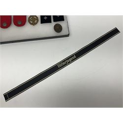 WW2 German Don Cossack epaulettes; and quantity of German insignia including SA Sports Badge for war wounded, Hitler Youth badge, Young Cossacks badge, Wound badge, Hitler Youth cuff title etc; in glass topped display box.