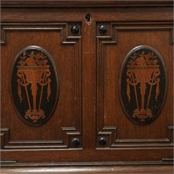Late 19th to early 20th century Bonheur de Jour or writing bureau, the upper section enclosed by fall front decorated with geometric mouldings and oval inlaid panels depicting floral urns and swags, fitted with document divisions and two small drawers, the lower section fitted with two drawers with applied mouldings, on turned supports united by undertier, 'Hobbs & Co of London' locks