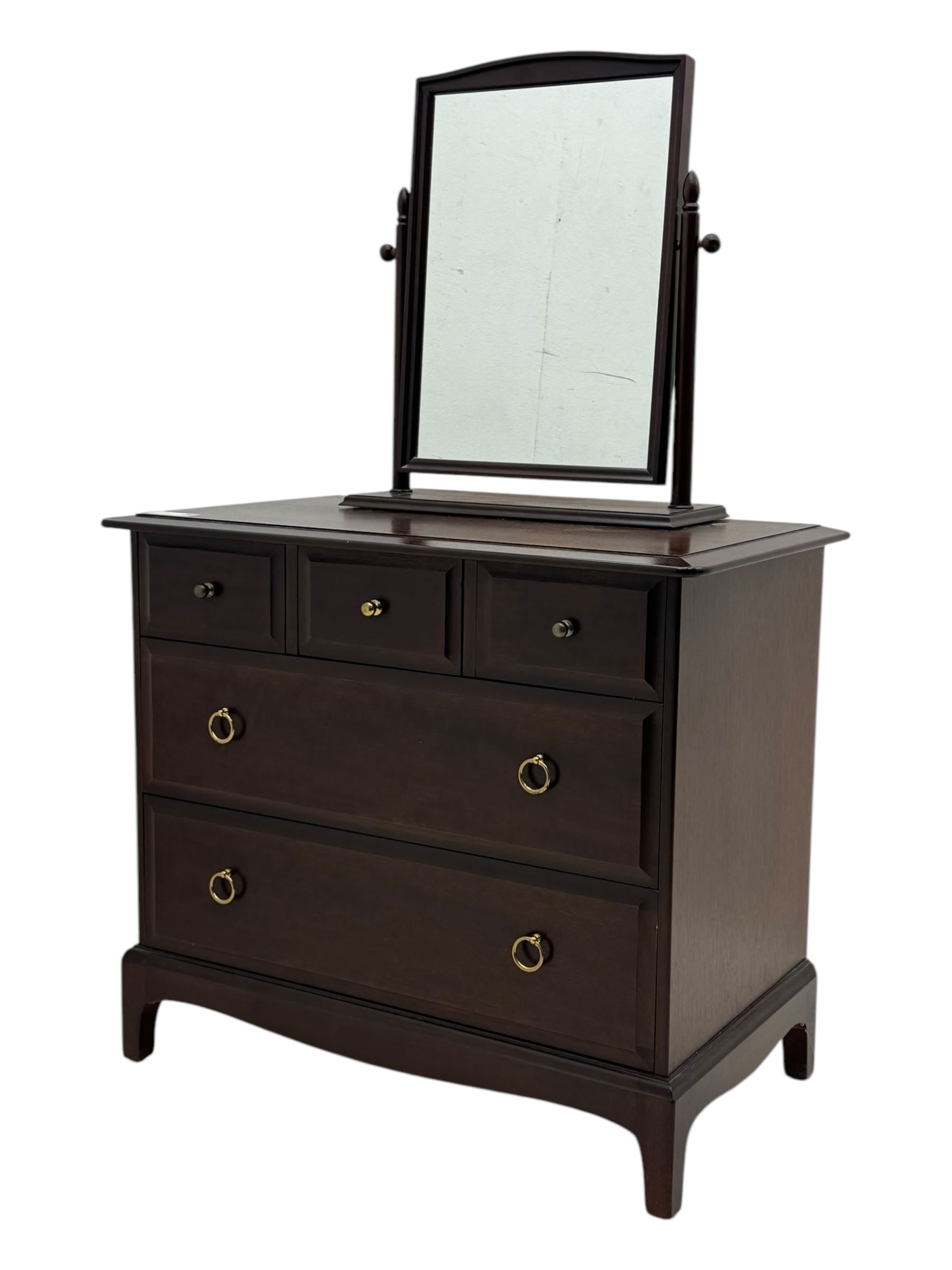 Stag Minstrel - mid-20th century mahogany dressing chest, rectangular top over three short and two long drawers, on bracket feet; matching swing mirror on turned supports