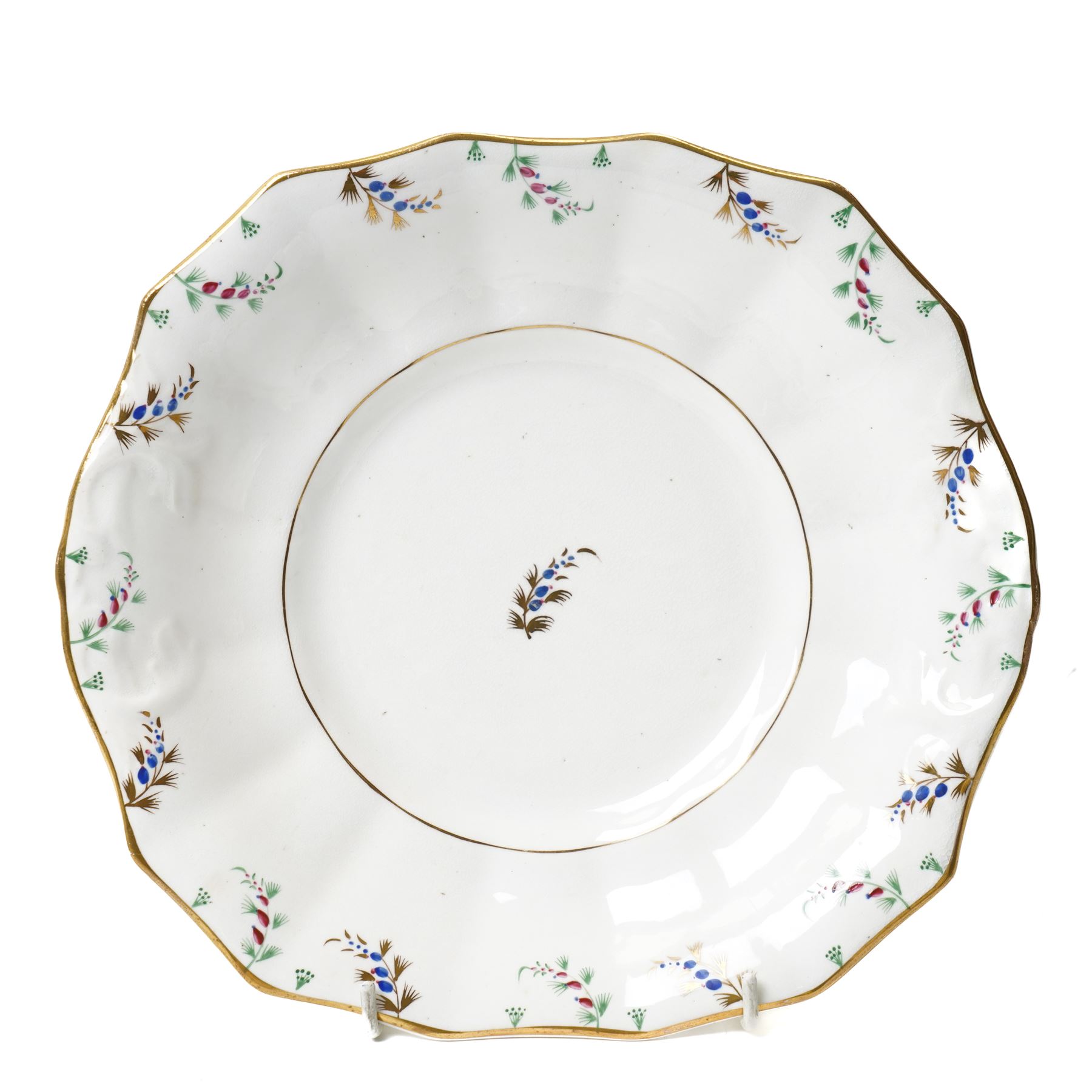 19th century English porcelain tea service, possibly Coalport, comprising teapot, covered sucrier, ten teacups and saucers, slop bowl, milk jug, and two serving dishes