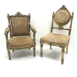 Gilt wood framed heavily carved armchair, upholstered in pale gold fabric with floral pattern, turned supports (W63cm) and similar single chair (W55cm)