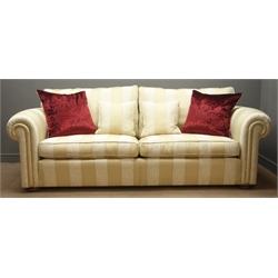  Duresta Waldorf Grande three-seat sofa with scroll arms, upholstered in Ivory striped fabric with scatter cushions, W244cm, H98cm, D107cm  