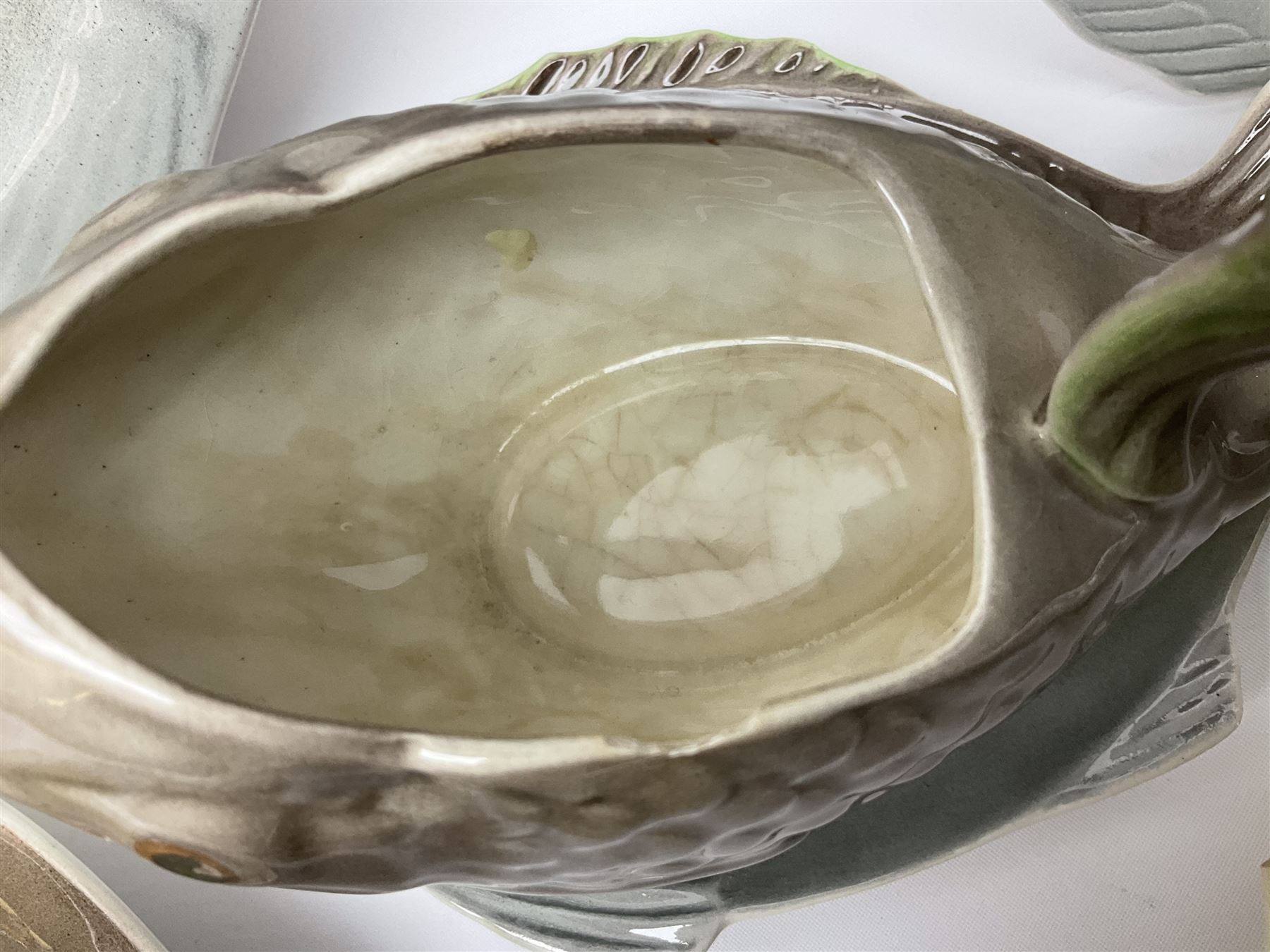 Shorter & Son six fish plates, together with a larger platter and sauce boat and saucer, all with stamped marks beneath