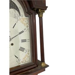 W. Phillips of Bromyard - 8-day mahogany longcase with a painted moon roller dial, c 1790,
swans neck pediment with dog tooth moulding, raised carving and  brass paterie, break arch hood door beneath flanked by reeded pilasters with brass Corinthian capitals, trunk with a blind fret, reeded quarter columns and long wavy topped door,
Plinth with a deep moulding and canted corners raised on a shaped base, painted dial with gesso spandrels, Roman numerals, five minute Arabic's and minute dots, with steel hands, seconds dial and square date aperture, dial pinned to a rack striking movement with an anchor escapement, striking the hours on a cast bell. A clockmaker by the name of John Phillips is recorded as working in Bromyard (Worcs)  in the early to mid 18th century, certainly by 1770-90. W. Phillips was possibly an unrecorded son or brother also working in the same family clockmaking business during the later part of the 18th century.
