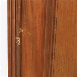 Edwardian walnut double wardrobe, fitted with two panelled doors, opening to reveal fitted interior with hanging space, three sliding linen trays and three drawers