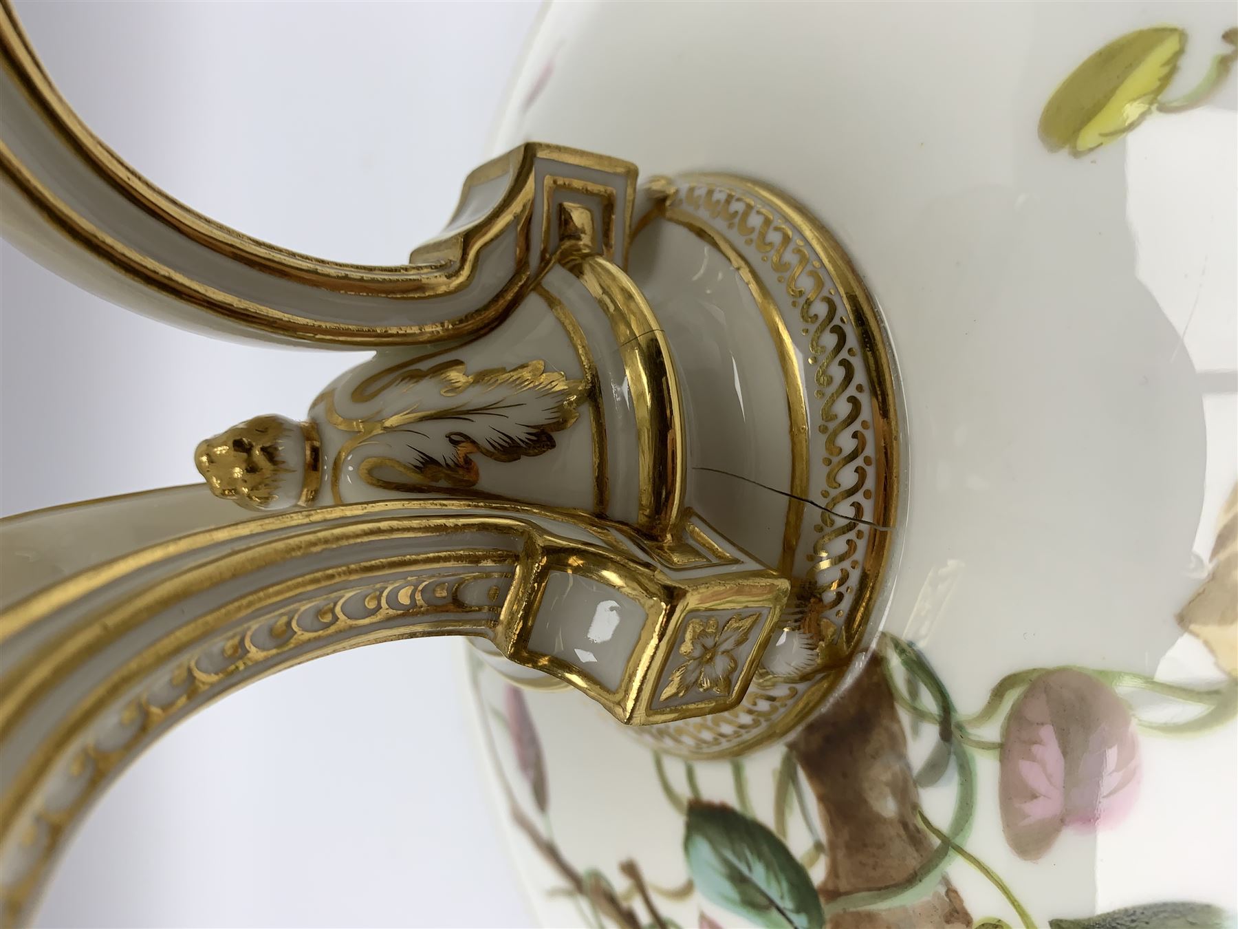 19th century Minton dessert service, comprising four comports, one tazza, and twelve plates, each hand painted with birds perched upon branches, and further detailed with insects and heightened in gilt, with printed retailers mark beneath for John Mortlock Oxford Street London, and impressed Minton mark to most, comport H13.5cm, plates D23.5cm. 
