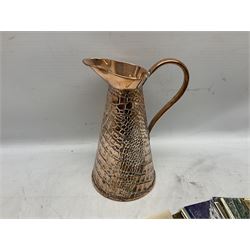Copper crocodile skin effect jug, together with a collection of postcards including a silk example, jug H29cm