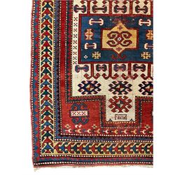 Small Turkish rug, repeating geometric pattern border