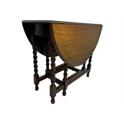 Early 20th century oak gateleg table, oval top with drop leaves supported by barley twist swing supports, united by plain stretchers, on turned feet (W119cm, D92cm, H77cm);