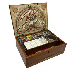 19th century mahogany paint box by G Rowney & Co, the top section with various original blocks of paint, mixing dish, and a variety of accessories, H9cm