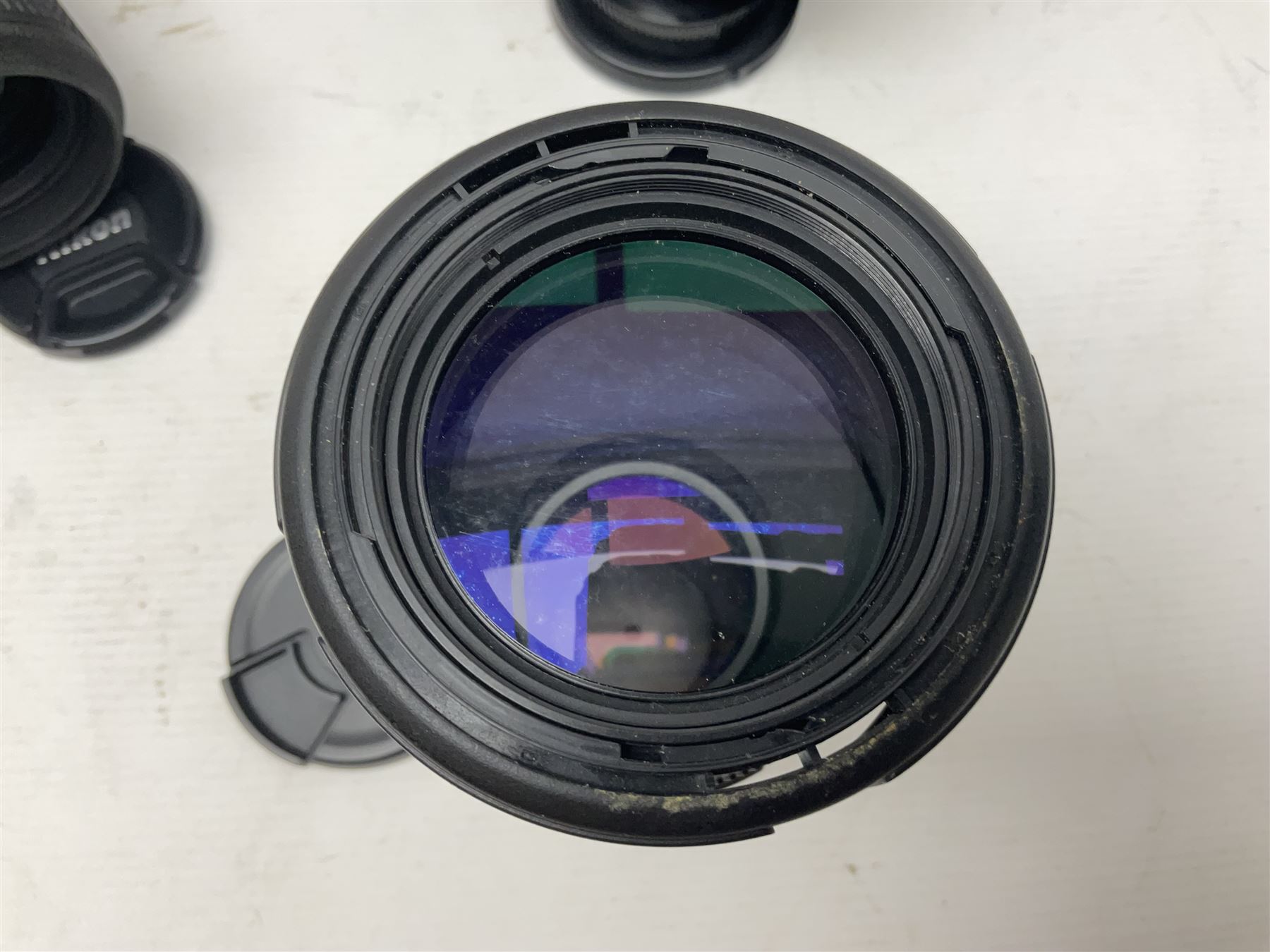 Nikon 'ED AF Micro Nikkor 200mm 1:4D' lens, Tamron 'SP Di AF 180mm 1;3.5 Macro1:1' lens, serial no 501075 and Tamron 'AF 70-300mm 1:4-5.6 Tele-Macro (1:2) ' lens, serial no 305906  