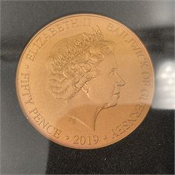 Queen Elizabeth II Bailiwick of Guernsey 2019 'The Titanium Moonlanding' fifty pence three coin set, comprising 'Green', 'Orange' and 'Blue' titanium coins, in capsules and case with certificate