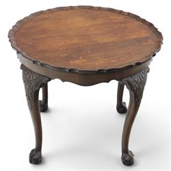 Georgian design piecrust coffee table with acanthus carved cabriole supports, seated on ball and claw feet