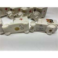 Ten WW1 crested china military models comprising seven field ambulances and three 'Home Fires Burning' fire-surrounds/range; various makers including Willow Art, Arcadian China, Grafton China, Savoy China, Carlton China etc; various crests including Devon, Aldershot, Portsmouth, West Ham, Coventry, Oxford, Hastings, Brighton etc (10)