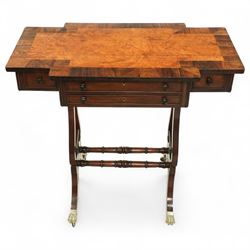 Early 19th century Regency burr elm work table, rosewood crossbanded top with notched corners above shaped end supports united by a turned stretcher, on brass paw feet and castors, stamped W Mason on lower turning