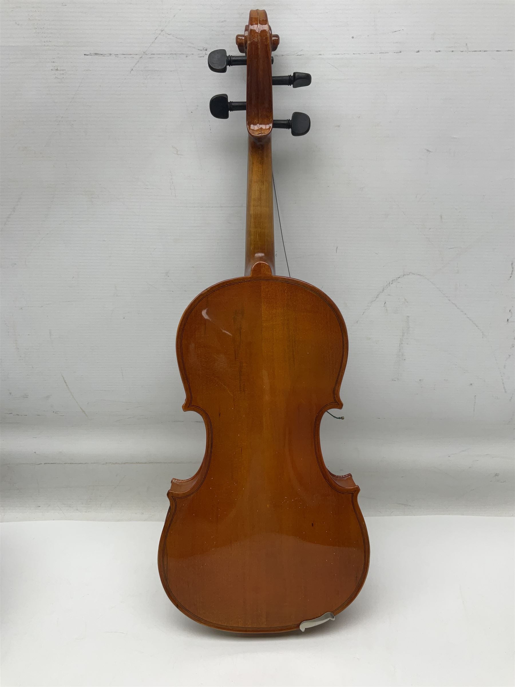 Four student violins - two Chinese three-quarter size with 33.5cm and 34cm two-piece backs; Stringers of Edinburgh quarter size with 28cm two-piece back; and Stentor quarter size with 28cm two-piece back; each in carrying case (4)