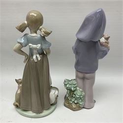 Five Lladro figures, including The Lamp Lighter no 5205,  Girl and Kittens no 6102, Cat no 5113 etc