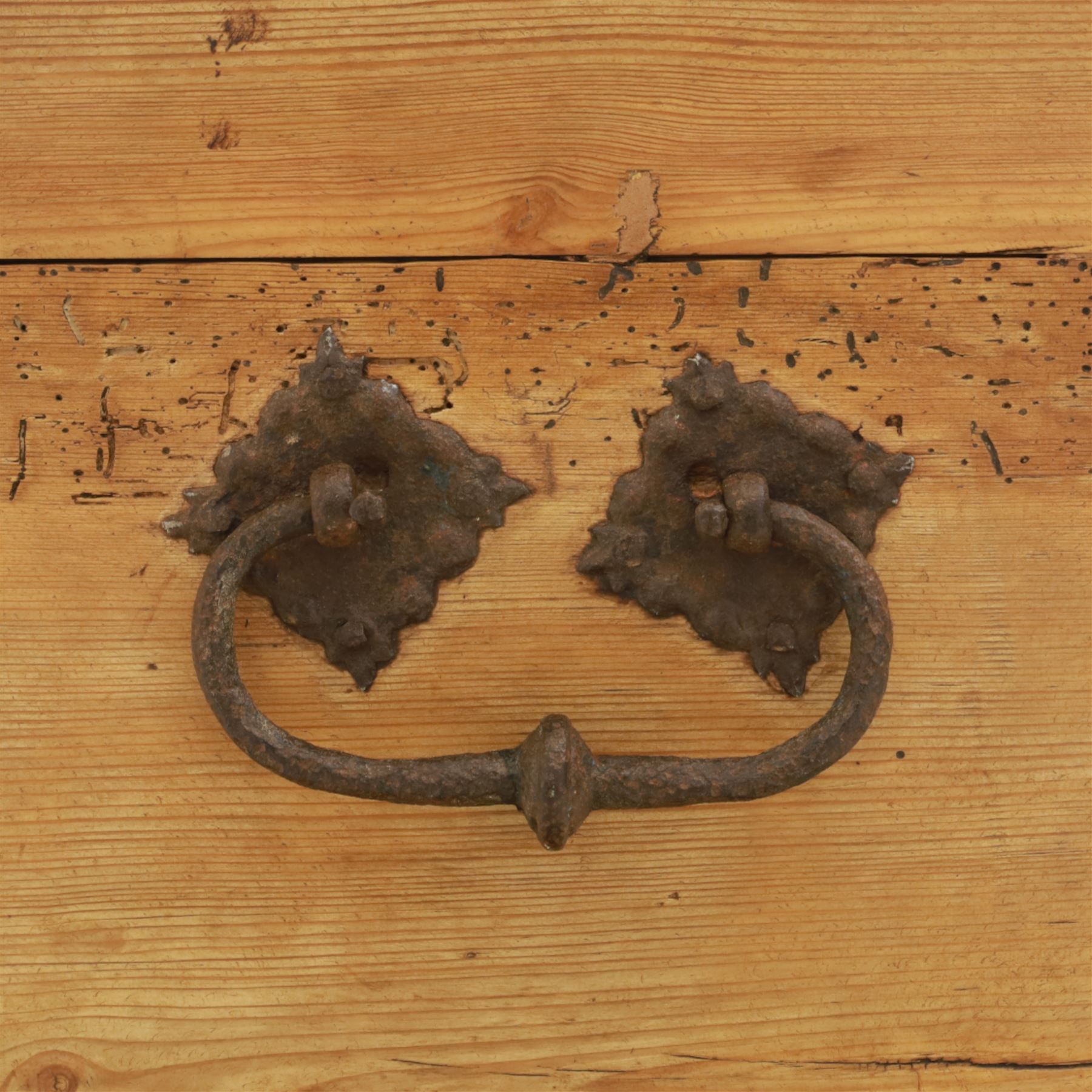 Early 20th century pine coffer, domed lid over plain front and sides with exposed dovetail joints, iron hasp and staple to front