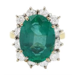 18ct gold oval cut emerald and round brilliant cut diamond cluster ring, hallmarked, emerald approx 5.80 carat, total diamond weight approx 1.00 carat