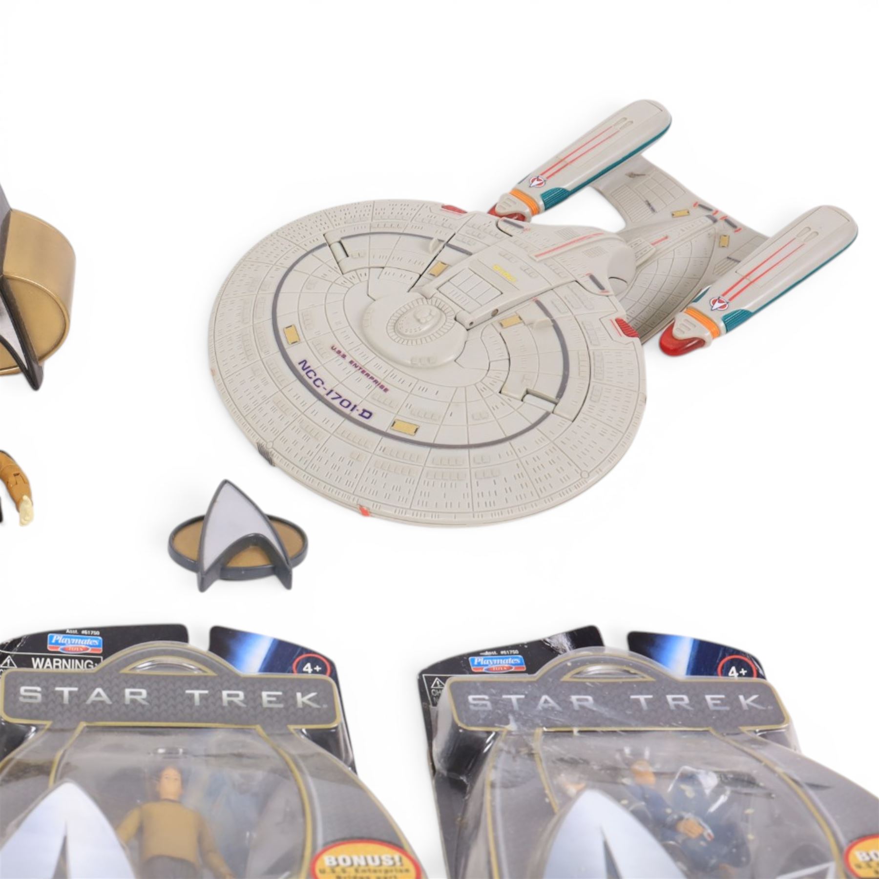 Four carded Playmates Star Trek figures, comprising Ensign Harry Kim, Galaxy Collection Kirk, Original Spock and Spock, together with a small collection of loose Star Trek models and star ships