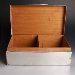 1920s silver mounted cigar box, of rectangular form with later applied vacant rectangular cartouche to hinged cover, opening to reveal compartmentalised softwood interior, hallmarked London 1923, makers mark worn and indistinct, H7cm, W22cm