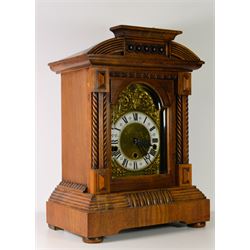 Late 19th century 8-day mahogany cased mantle clock chiming the hours and quarters on 8 gong rods, with a 20th century three train Hermle movement and floating balance escapement, Westminster, Whittington and silent chime select, break arch brass dial with cast spandrels and a 4
