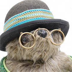 Gabrielle Designs Paddington Bear 'Aunt Lucy', 1978, dressed in green shawl, with hat and spectacles, tartan dress and luggage tag from the Peruvian Rugby FC Reserves Supporters Club, H50cm