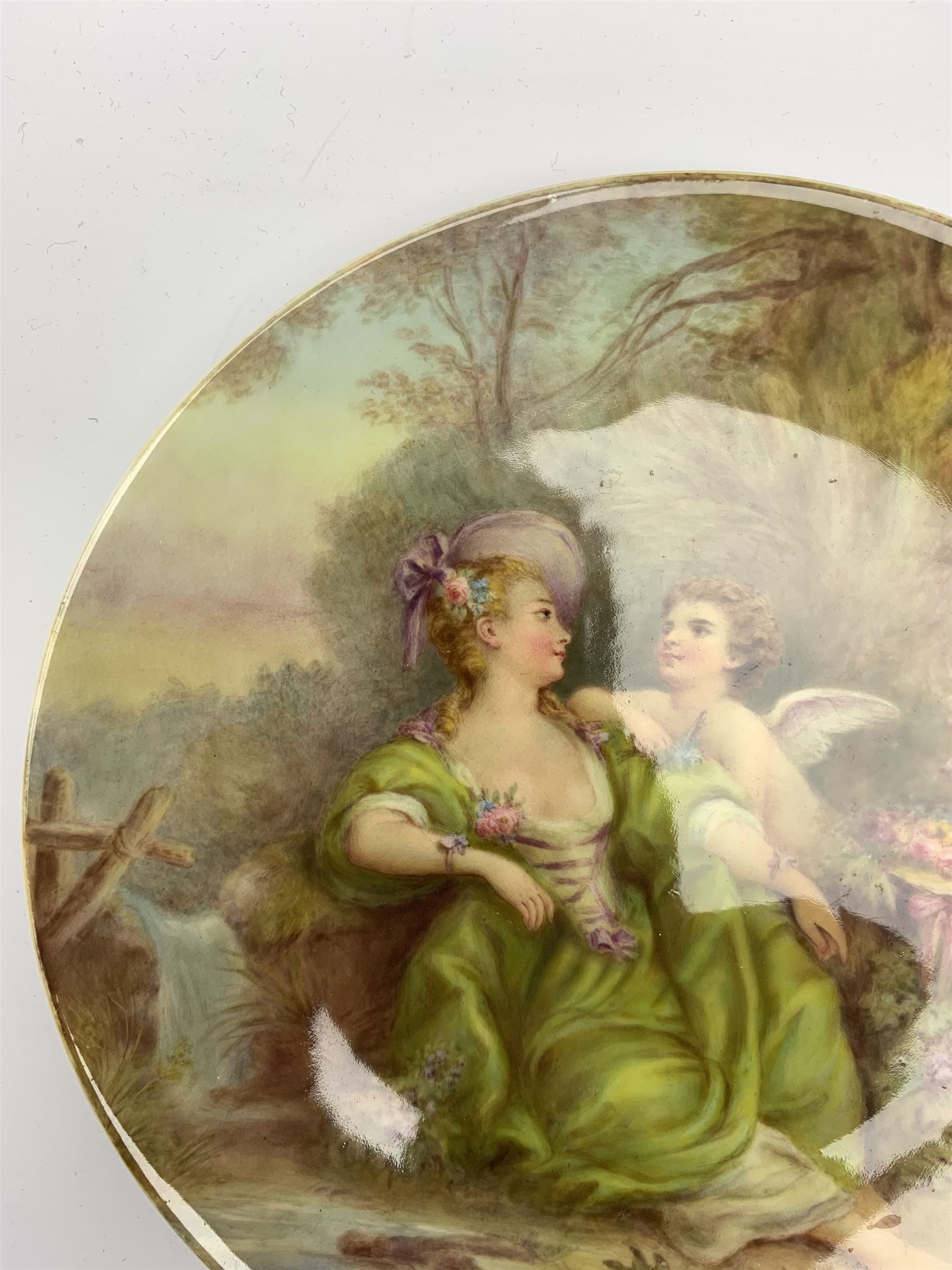 Late 19th century porcelain plate, hand painted by Frederick Sutton, depicting a female figure and putto within a wooded landscape, with recumbent sheep and brook to the fore, signed F N Sutton, unmarked verso, D22.5cm

Frederick Sutton was employed as a painter at the notable factories of Royal Worcester, Coalport, and Minton. 