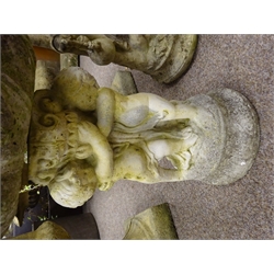  Two composite garden figure of a female H67cm, and a sundial on cherub support, H64cm (2)  