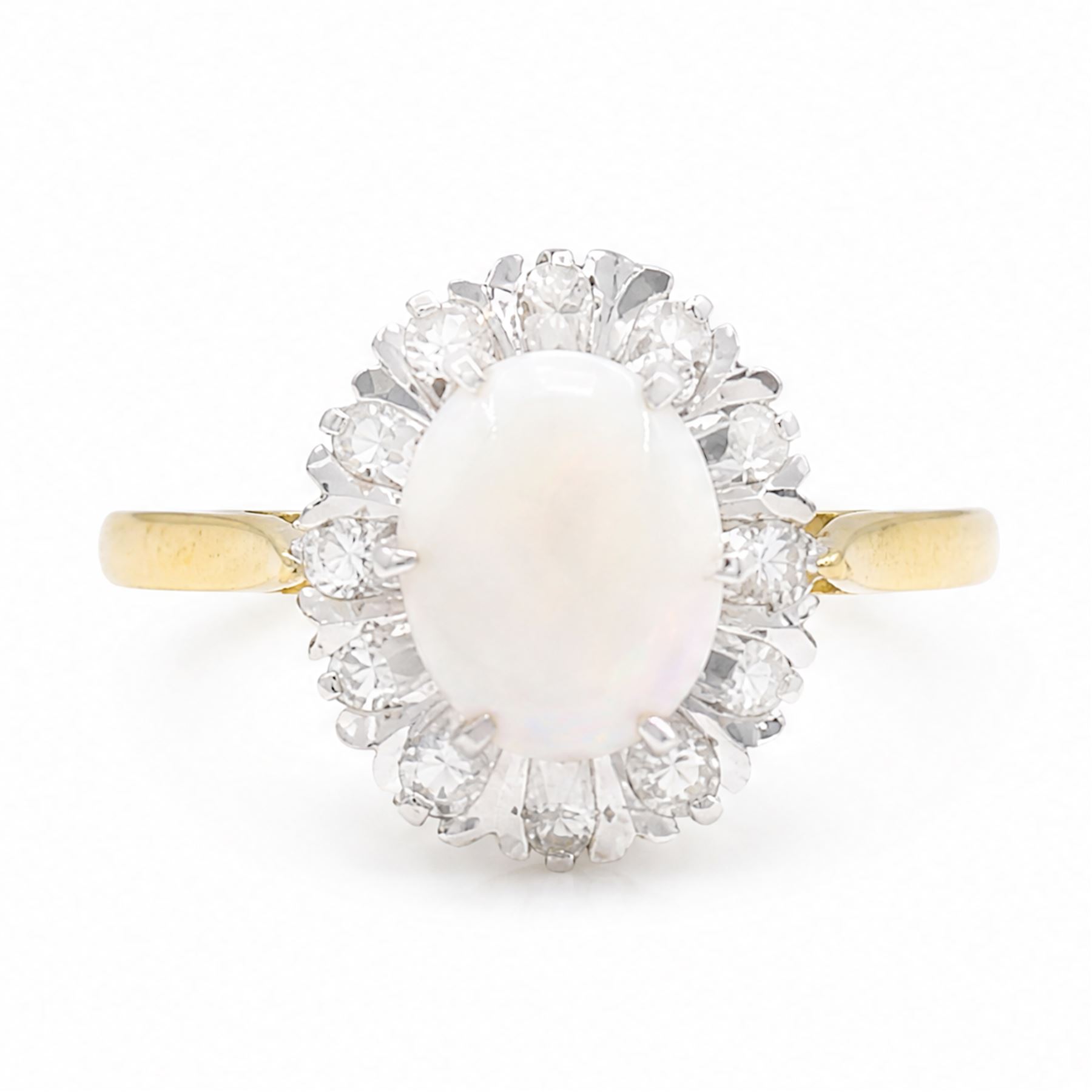 18ct gold opal and diamond cluster ring, oval cabochon cut opal surrounded by twelve single cut diamonds, London 1988