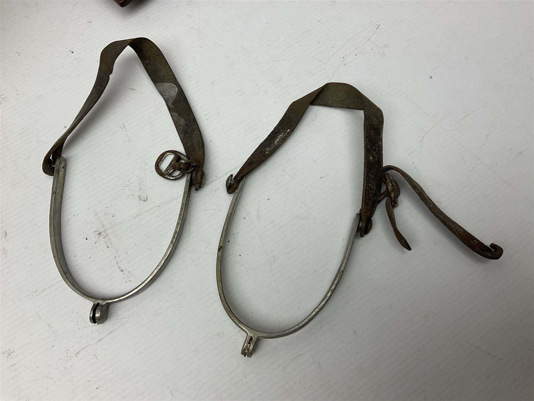 British Army General Staff officer's peaked cap by Herbert Johnson London in Moss Bros. delivery box; two officer's Sam Browne leather belts; leather pistol holster and sword hanger; pair of leather gloves and pair of spurs