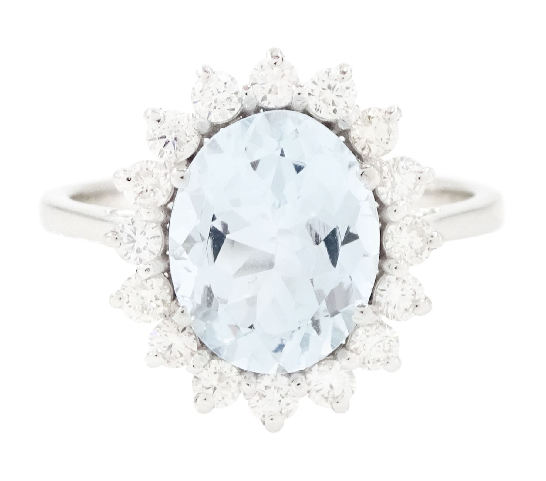 18ct white gold aquamarine and diamond cluster ring, single oval cut aquamarine of approx 2.25 carat, surrounded by sixteen round brilliant cut diamonds, stamped 18K, total diamond weight approx 0.50 carat