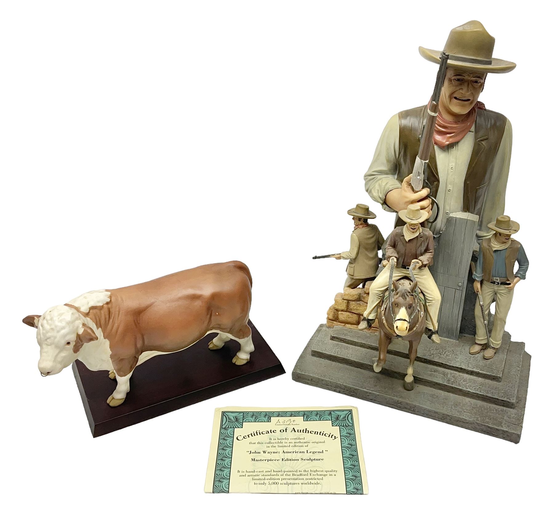 Beswick matte Hereford Bull, with stamped mark beneath, on wooden plinth, together with a limited edition Bradford Exchange John Wayne model, tallest H36cm