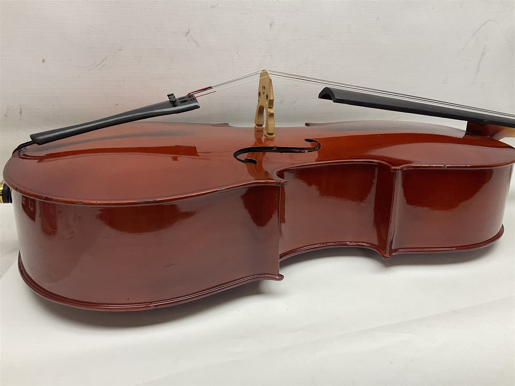 Gear4Music three-quarter sized cello with 70cm one-piece back and spruce top; bears maker's label; L112cm overall; in soft carrying case with Erich Steiner bow