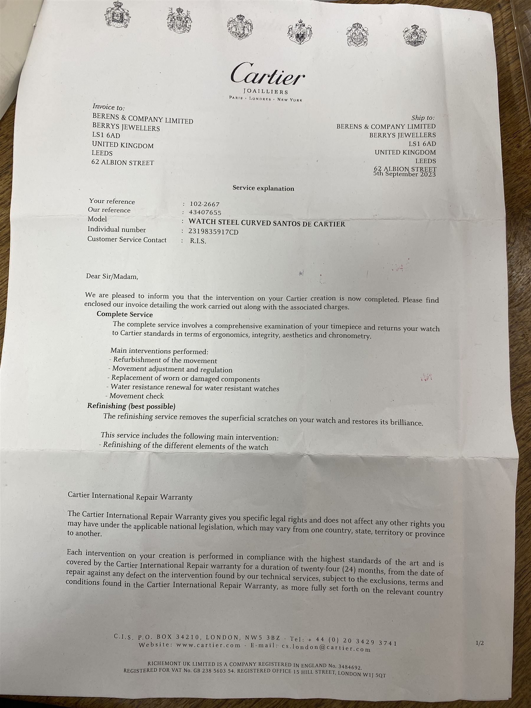 Cartier Santos Galbée gentleman's stainless steel automatic wristwatch, Ref. 2319, silvered guilloche dial with Roman numerals and secret signature at 7 o'clock, boxed purchase certificate dated 2003, pouch and service receipt dated September 2023